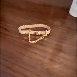 Rose gold pandora charm bracelet with safety charm